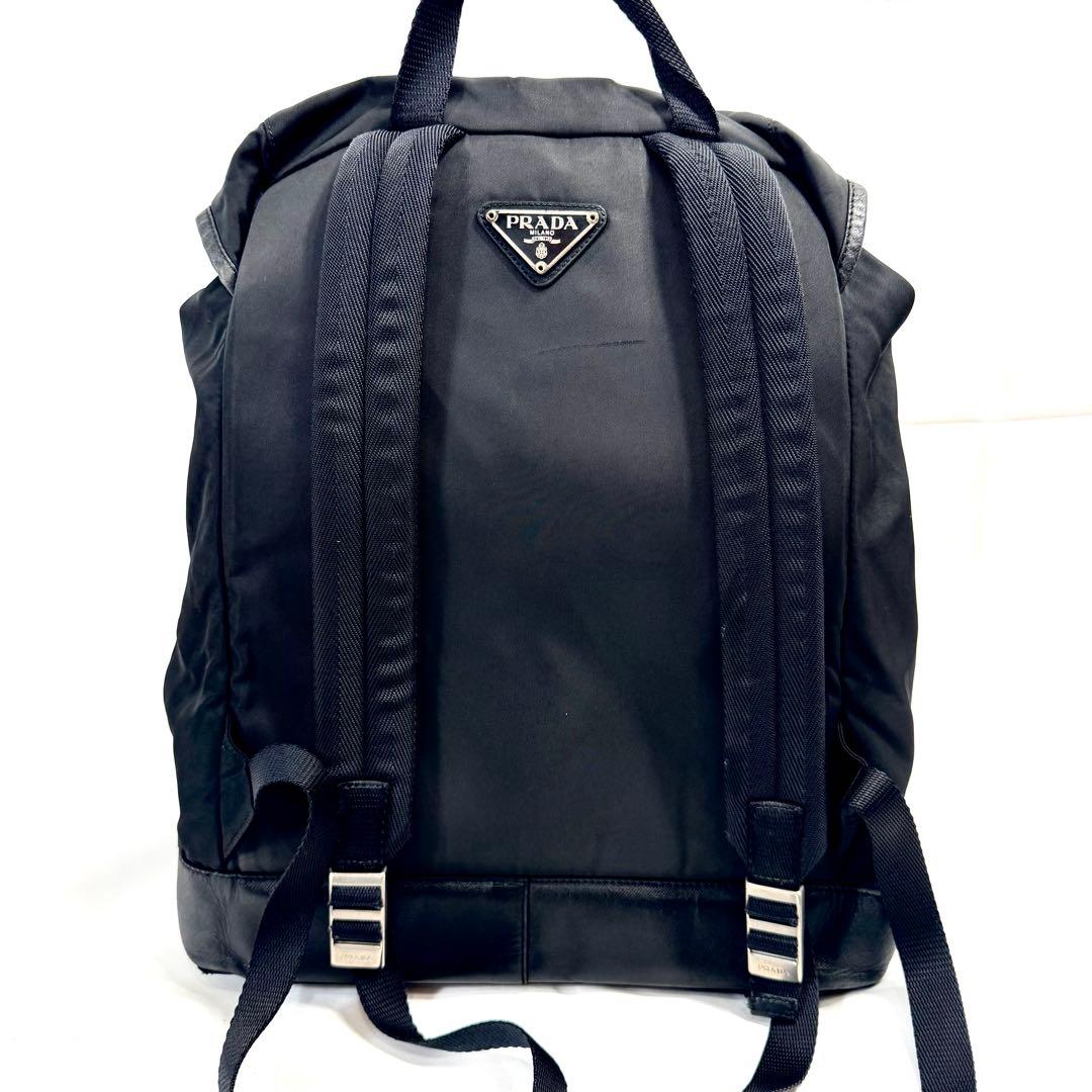 PRADA リュック ナイロン 三角 プレート 巾着 マルチポケット レザー