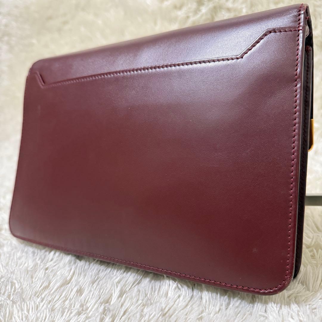 カルティエ　マストライン　クラッチバッグ　ボルドー　ロゴ金具