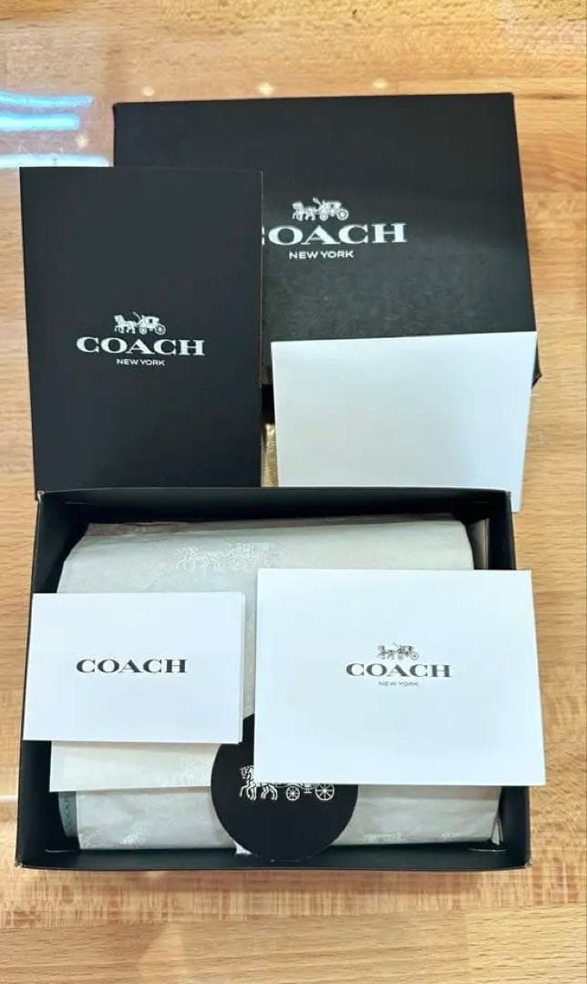 COACH 二つ折り財布 ライトブルー