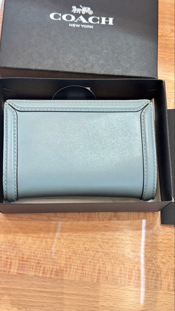 COACH 二つ折り財布 ライトブルー
