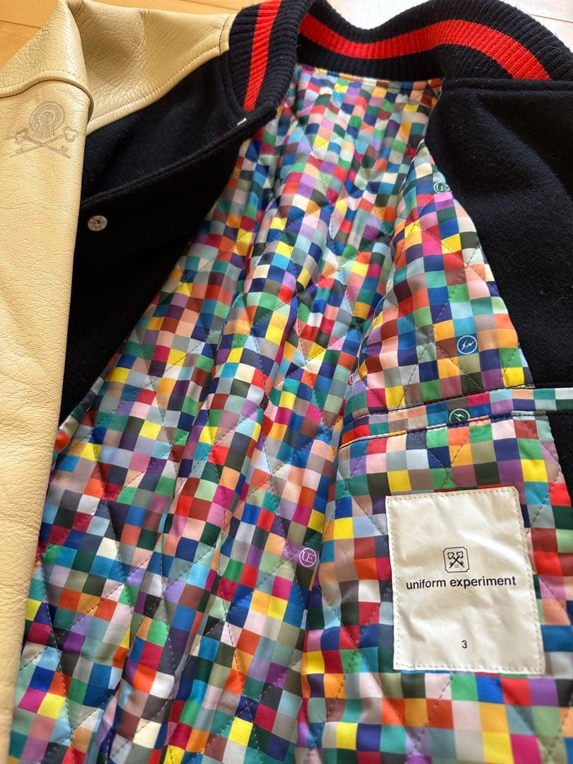 uniform experiment スタジャン フラグメント ネイビー L