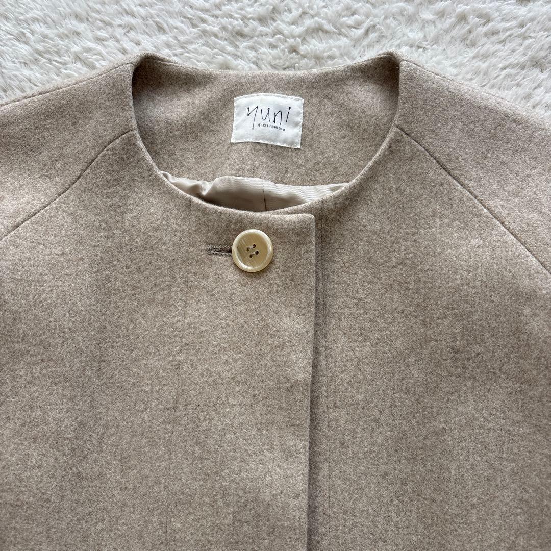 美品　yuni ユニ　ノーカラーロングコート　ウール　キナリ　ベージュ