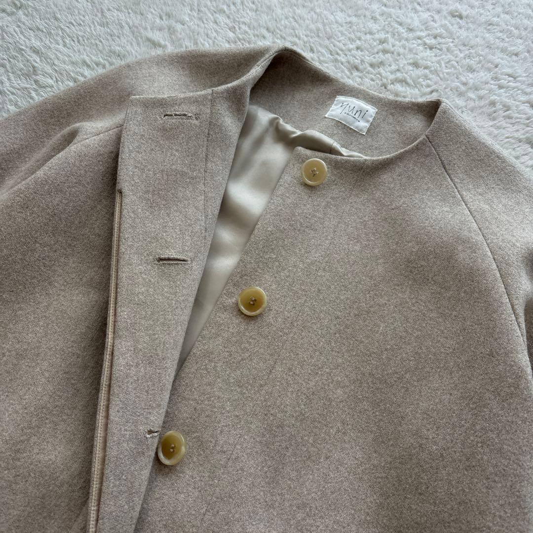 美品　yuni ユニ　ノーカラーロングコート　ウール　キナリ　ベージュ