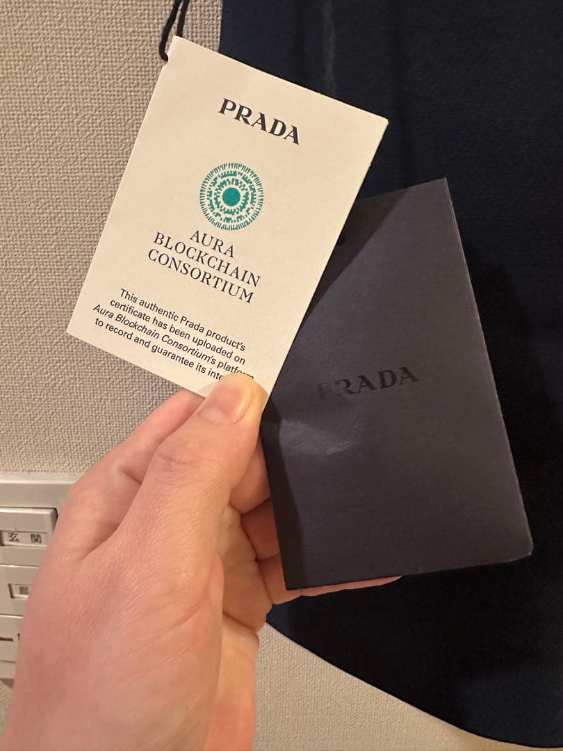 PRADA ネイビー ミニスカート　※ボタン外れあり