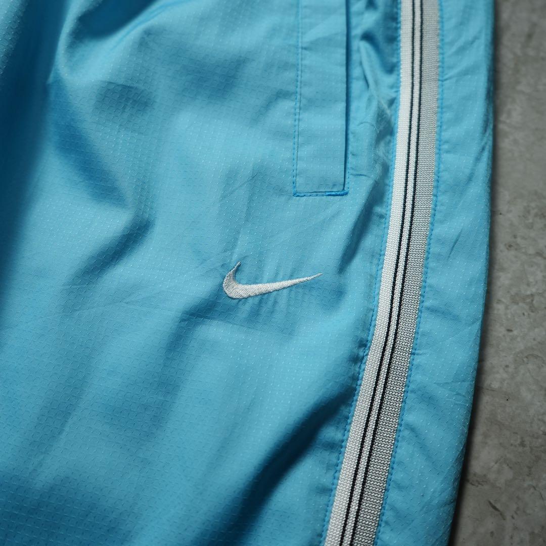 00s NIKE ワイドナイロンパンツ 水色 サイドライン 刺繍ロゴ y2k
