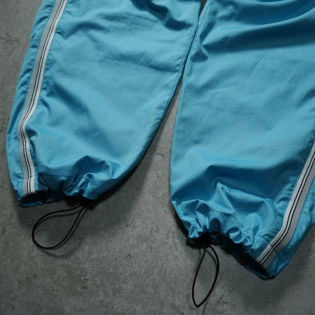 00s NIKE ワイドナイロンパンツ 水色 サイドライン 刺繍ロゴ y2k