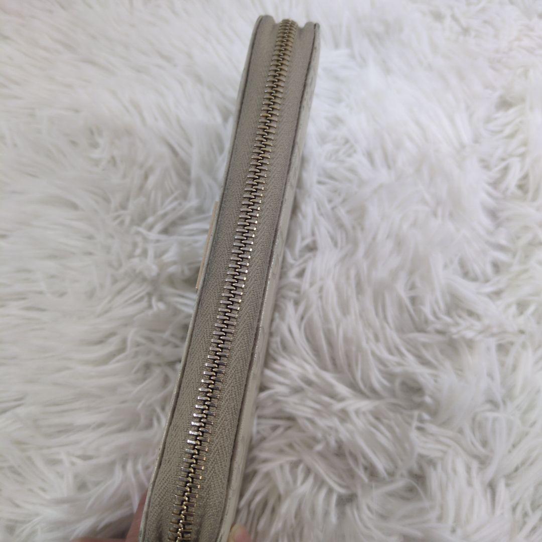 GUCCI 長財布 ラウンドジップ シマ 金プレート 型押し レザー ホワイト