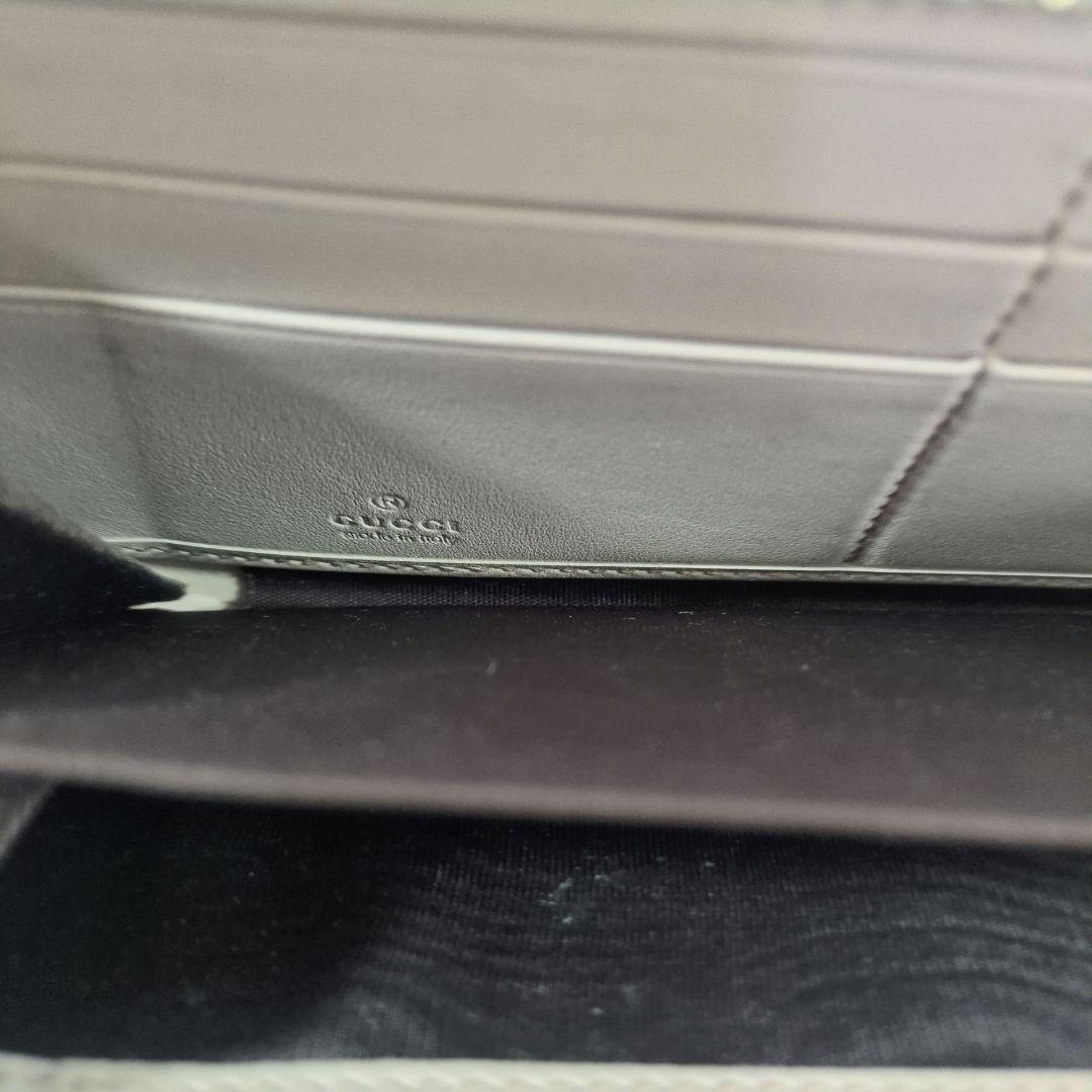 GUCCI 長財布 ラウンドジップ シマ 金プレート 型押し レザー ホワイト