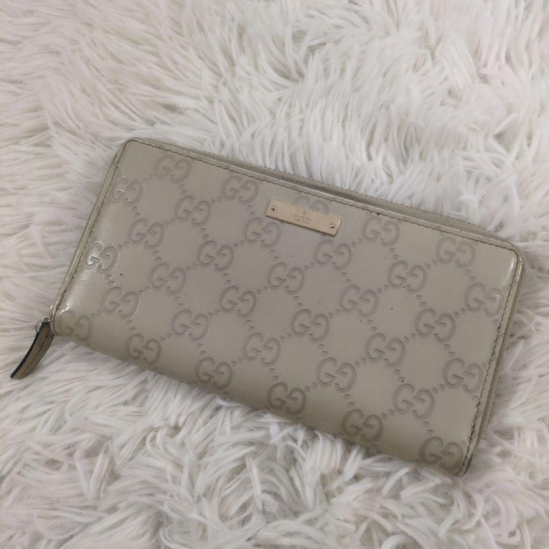 GUCCI 長財布 ラウンドジップ シマ 金プレート 型押し レザー ホワイト