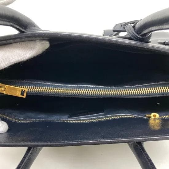 サンローラン レザー サック ド ジュール ベイビー ハンドバッグ