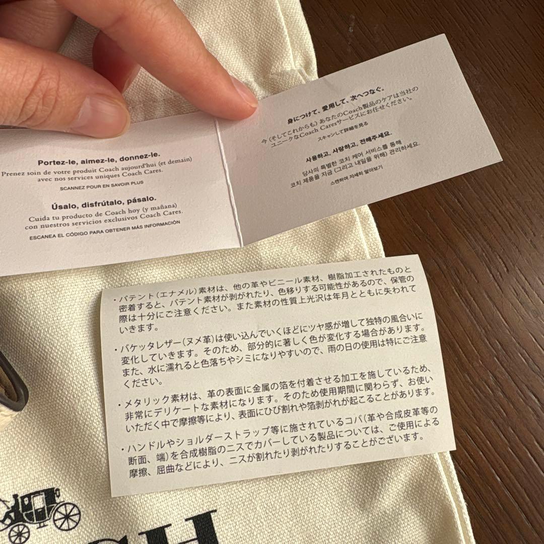 COACH フラワープリント レザーキーケース