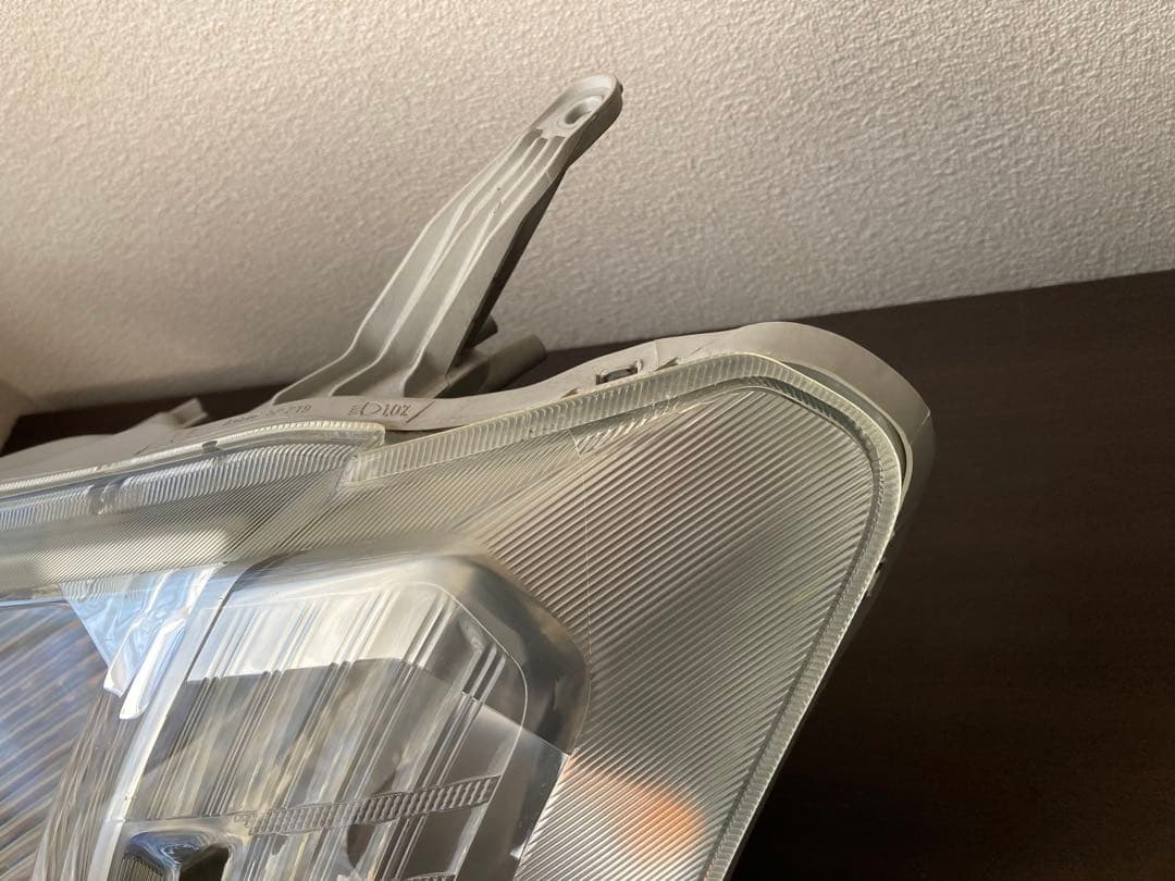 プロボックスサクシード(NSP160V)左ヘッドライト