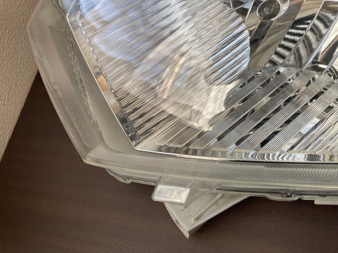 プロボックスサクシード(NSP160V)左ヘッドライト