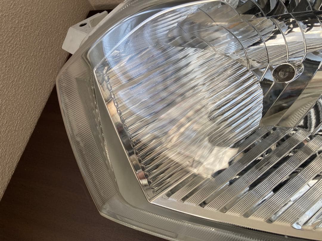 プロボックスサクシード(NSP160V)左ヘッドライト