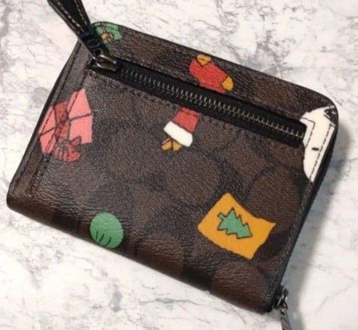 新品未使用コーチ二つ折り財布スヌーピーブラウンレディースメンズ送料無料即日発送