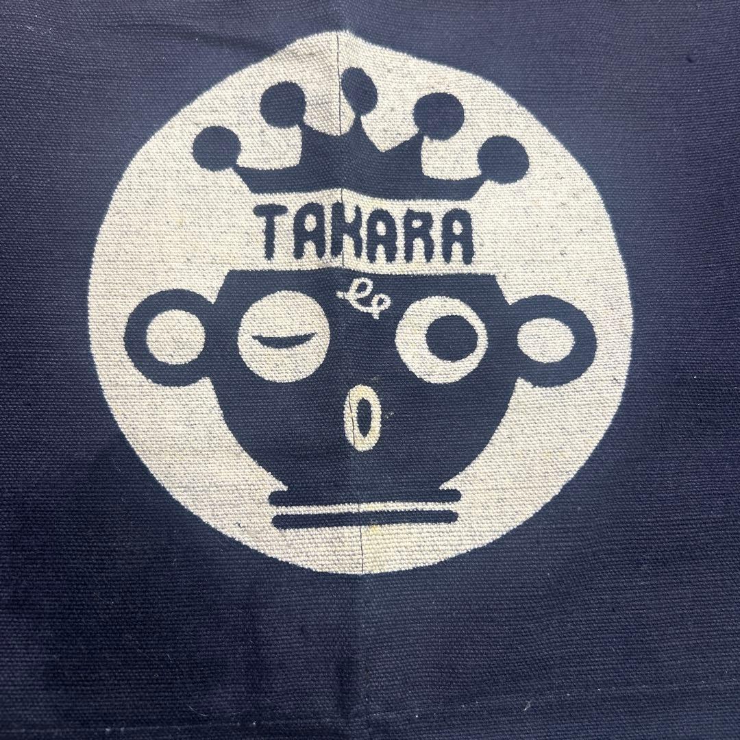 TAKARA だっこちゃんマーク エプロン ネイビー
