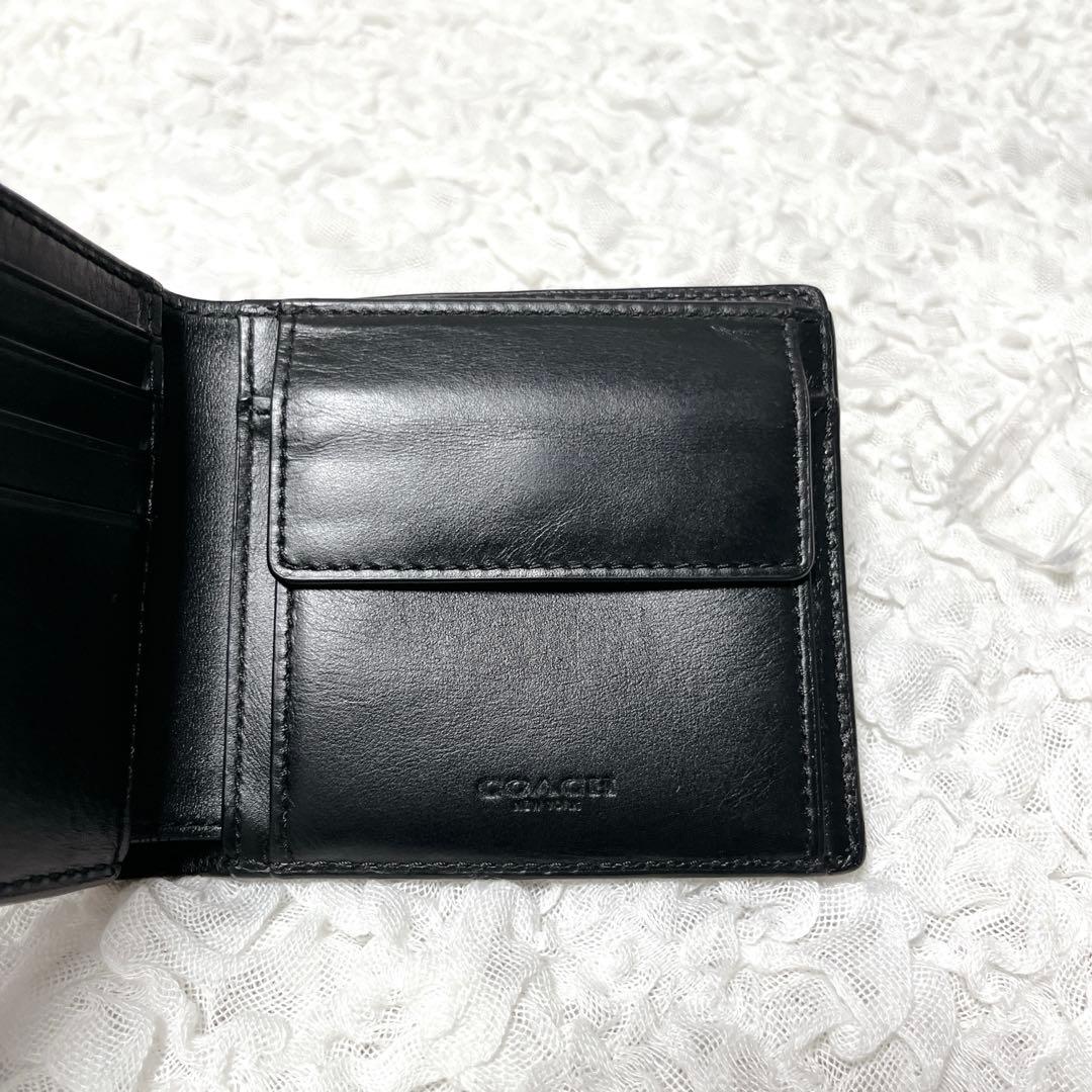 コーチ　シグネチャー　ブラック　レザー　二つ折り　財布　小銭入れ付　コンパクト