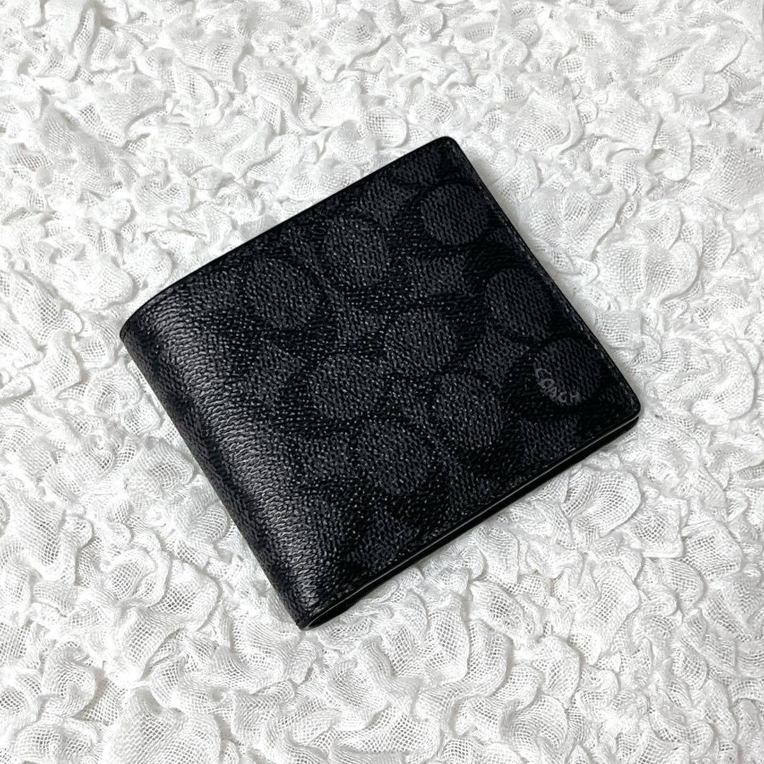 コーチ　シグネチャー　ブラック　レザー　二つ折り　財布　小銭入れ付　コンパクト