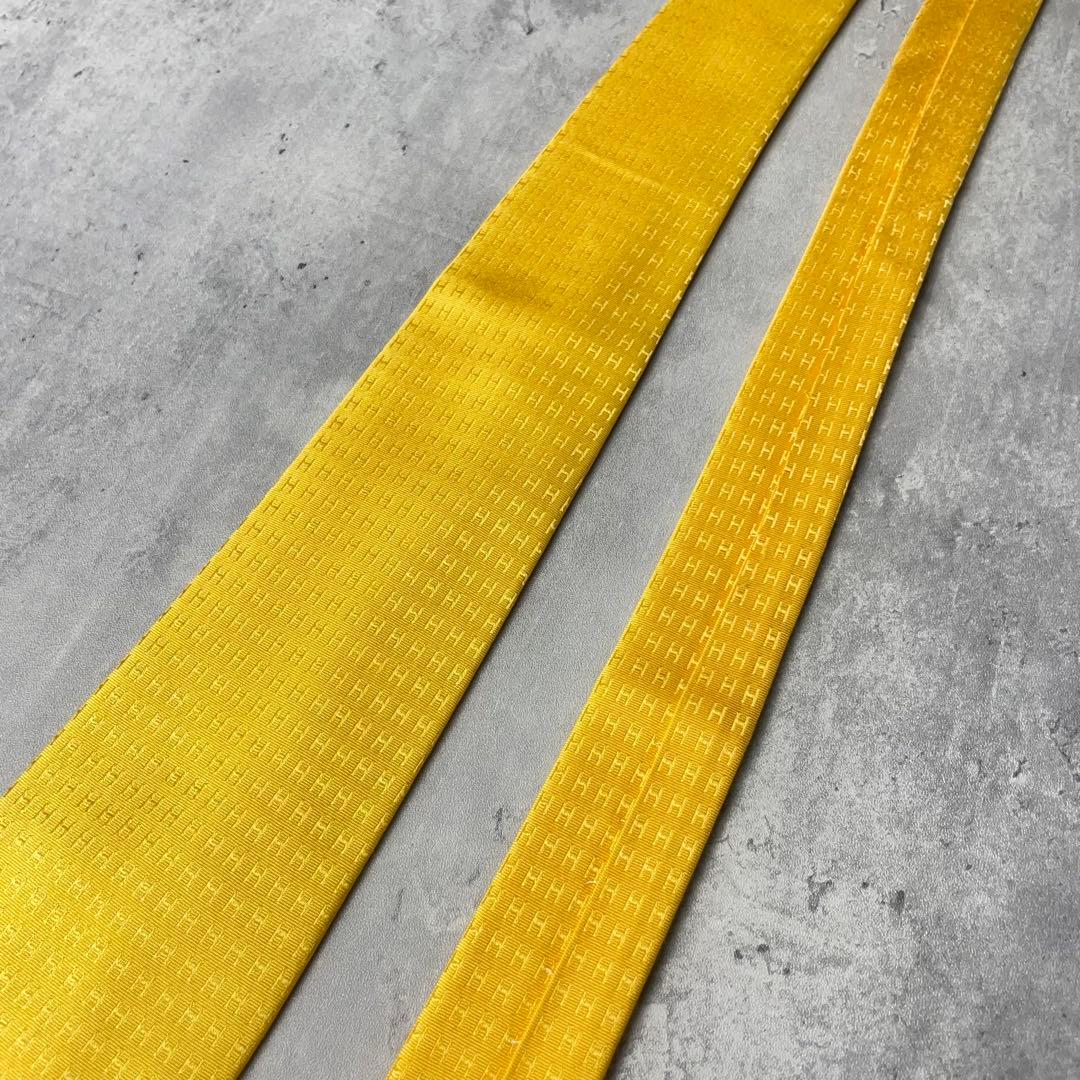 美品 HERMES エルメス H柄 総ロゴ ファソネ ネクタイ イエロー 黄