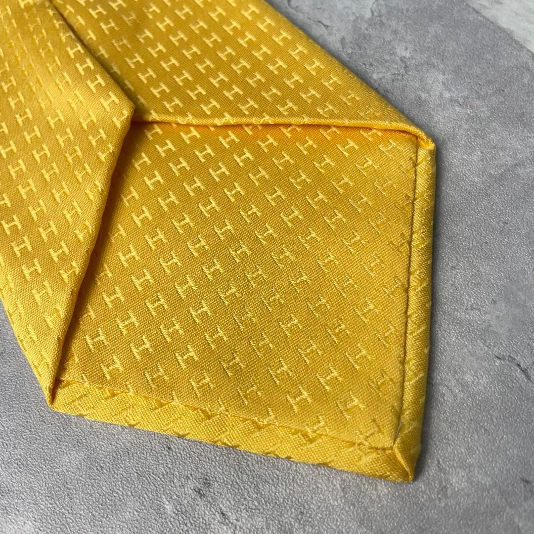 美品 HERMES エルメス H柄 総ロゴ ファソネ ネクタイ イエロー 黄