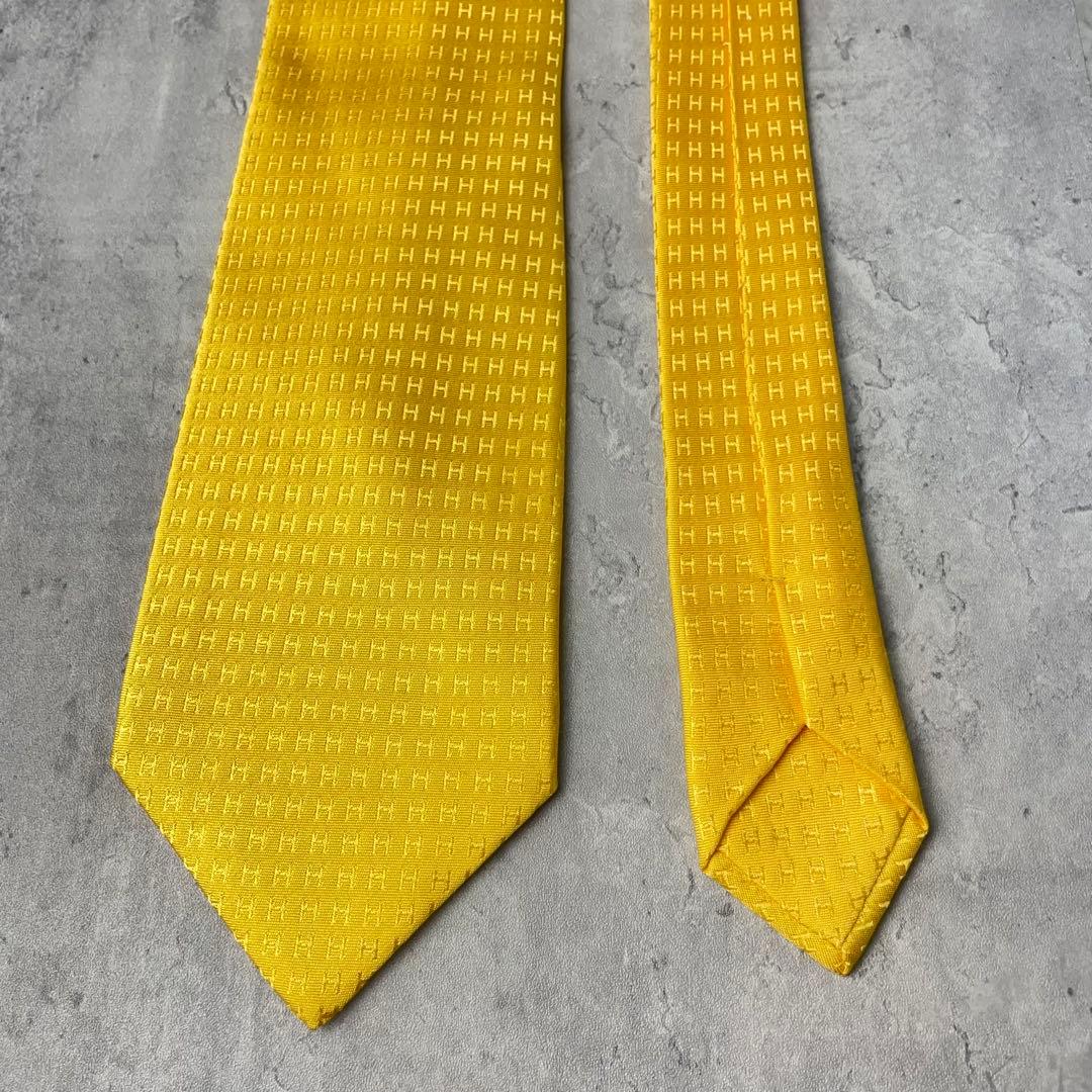 美品 HERMES エルメス H柄 総ロゴ ファソネ ネクタイ イエロー 黄
