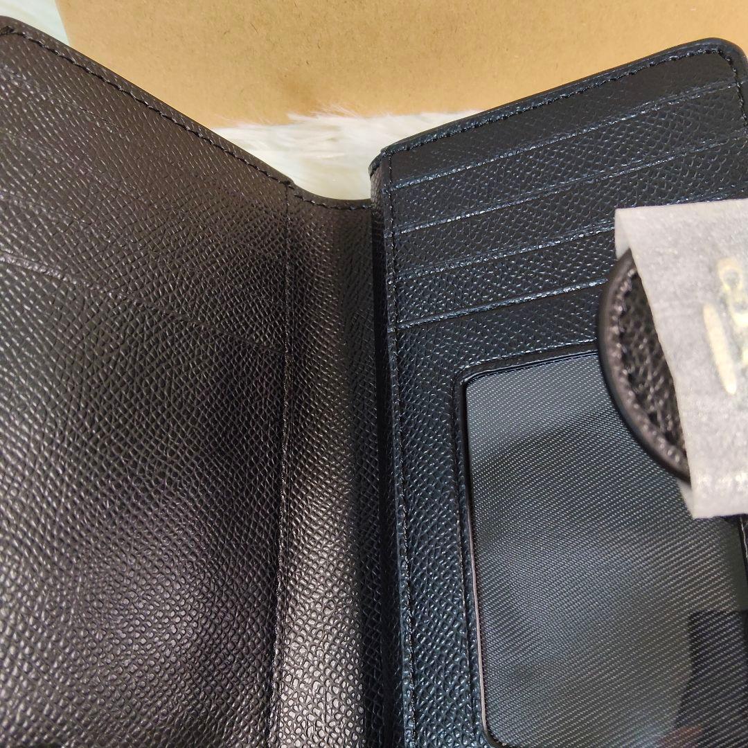新品✨COACH ブラック レザー 二つ折り 財布 シンプル