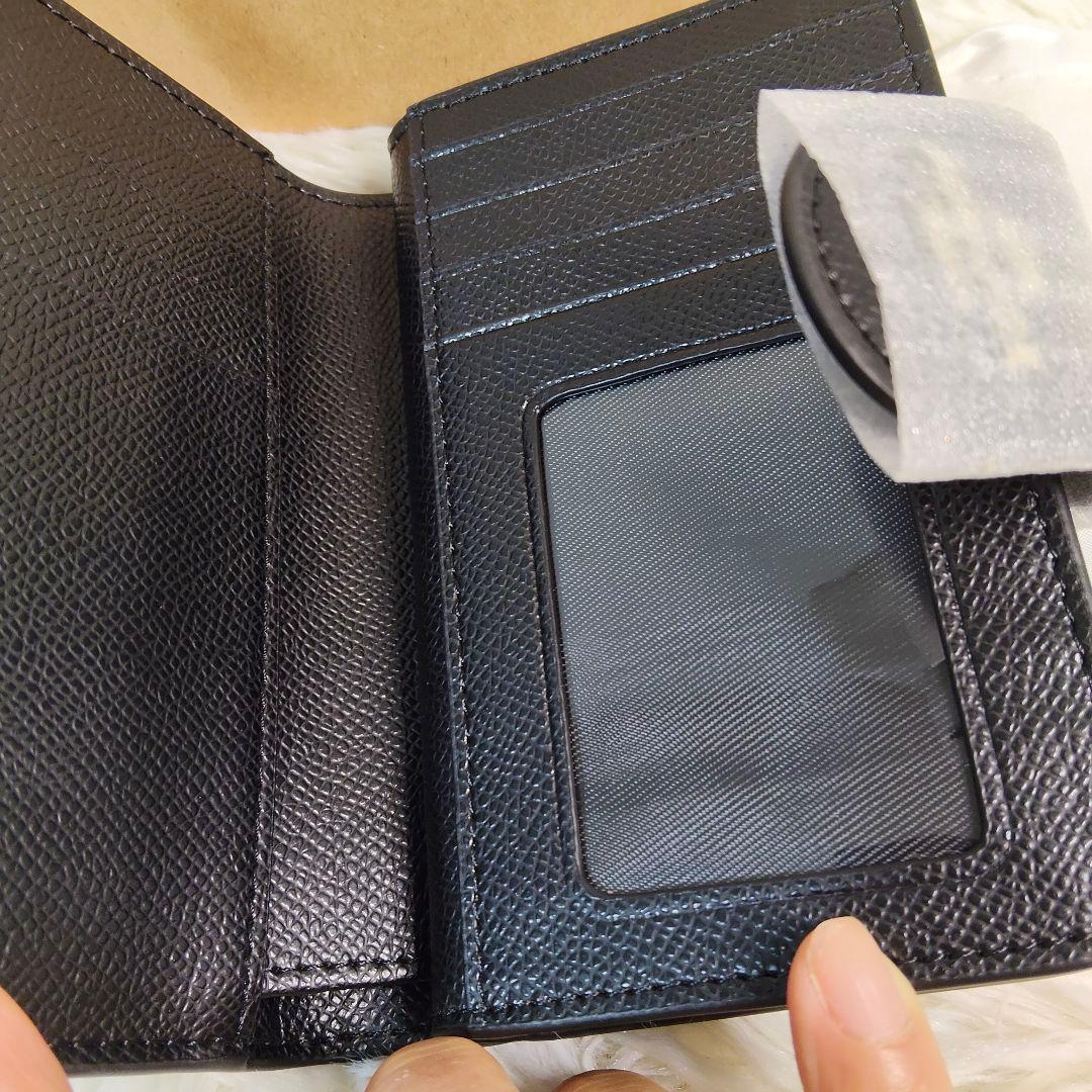 新品✨COACH ブラック レザー 二つ折り 財布 シンプル