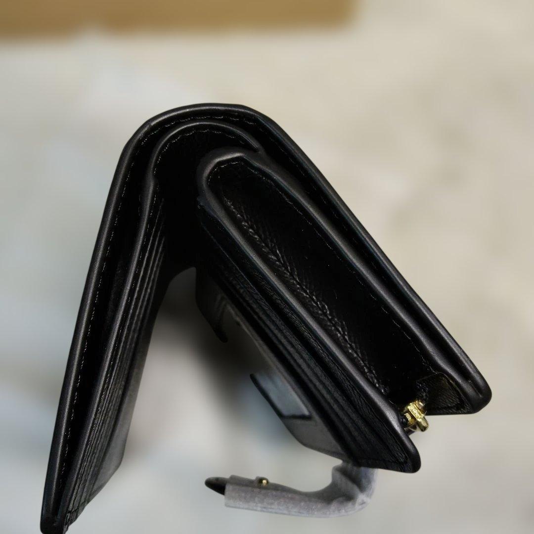 新品✨COACH ブラック レザー 二つ折り 財布 シンプル