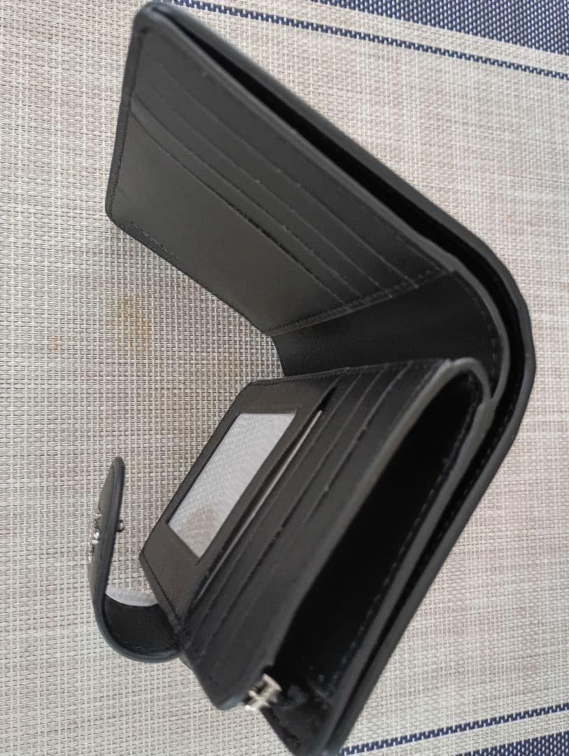 ＣOACH 二つ折り財布 フラワーパターン