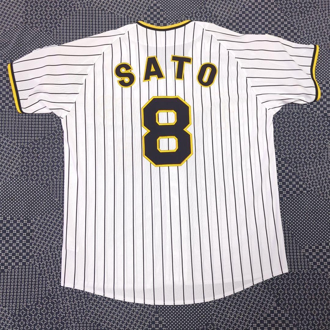 阪神タイガース　チャンピオン　エンブレム付き　ユニフォーム　佐藤輝明【Ｌサイズ】