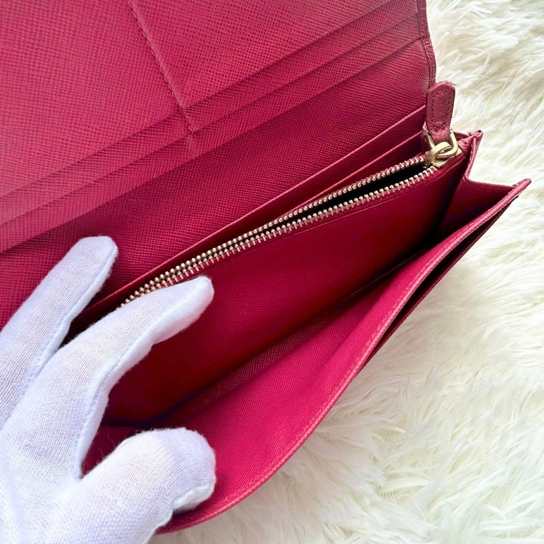 美品✨プラダ 長財布 サフィアーノ フィオッコ ピンク メタルロゴ リボン