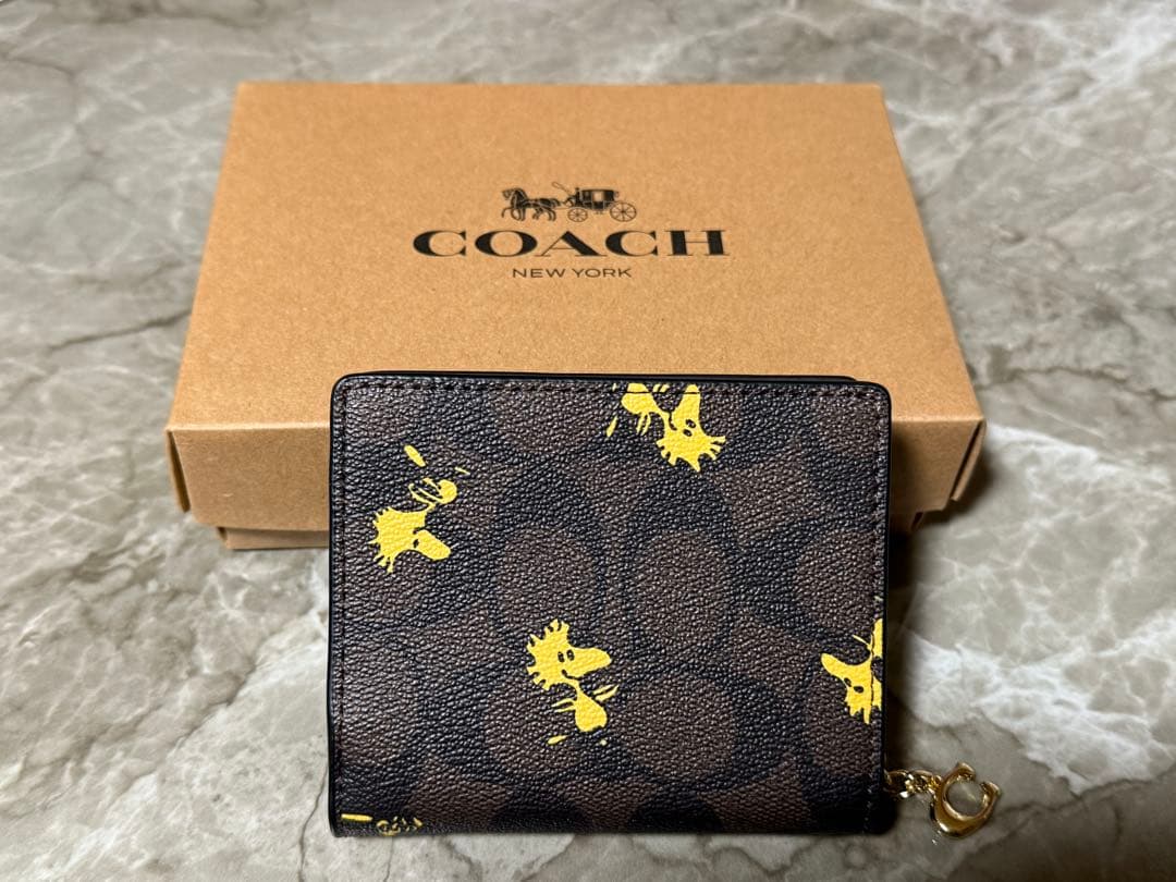 COACH 二つ折り財布