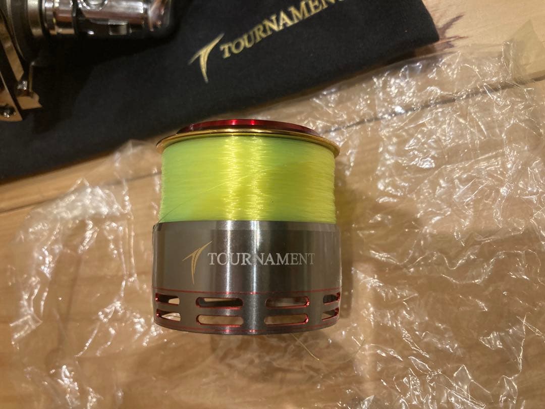 TOURNAMENT 06リール 収納袋付き