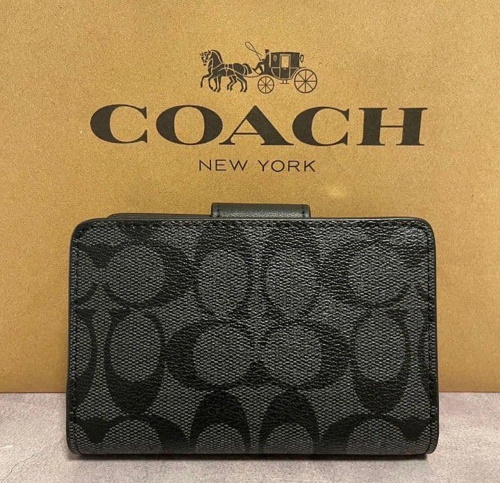 新品未使用コーチ二つ折り財布ブラックシグネチャーレディースメンズ送料無料即日発送