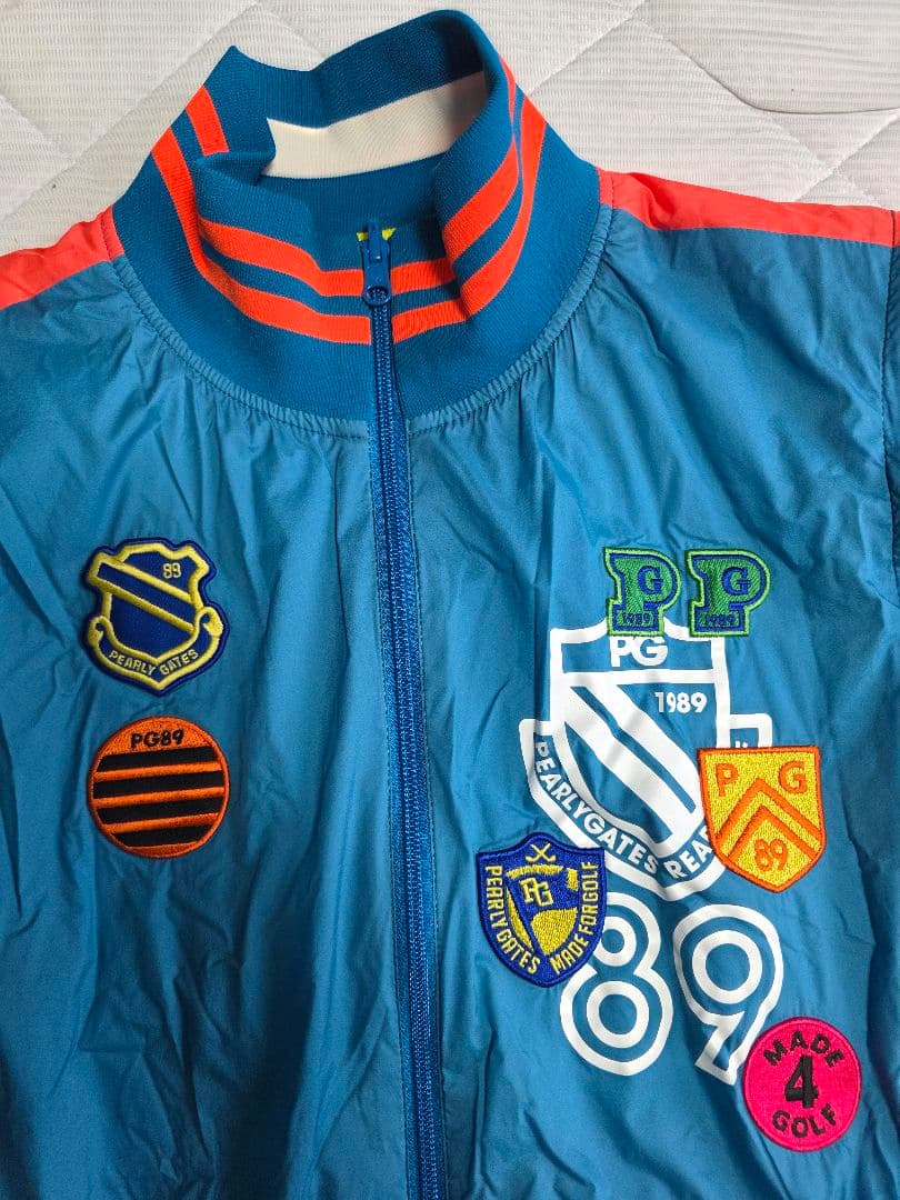 美品パーリーゲイツ蓄熱・防風・撥水中綿リバーシブルジャケット４