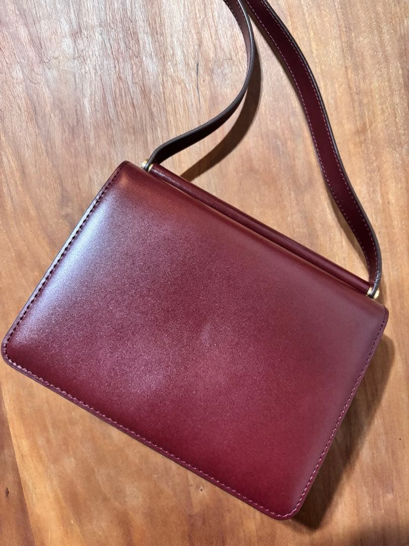 TOUT Y EST ポルメミニバッグ バーガンディ