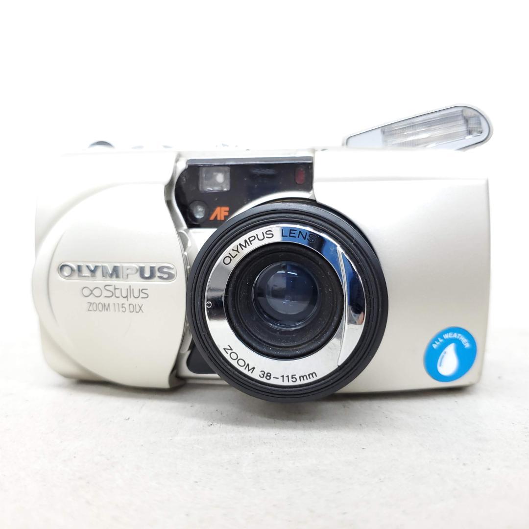 Olympus ∞ Stylus ZOOM 115 F1205-14-9v p