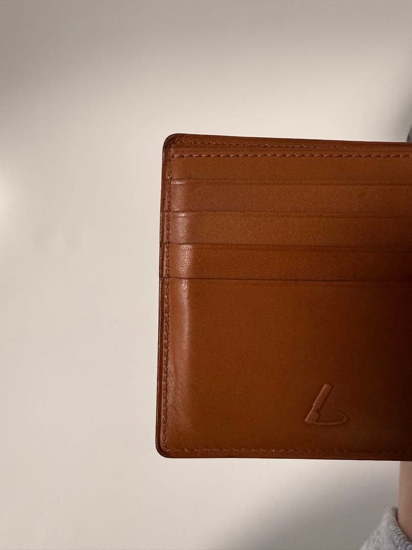 【土屋鞄】コードバン二折財布 ネイビー（小銭入れ 有）