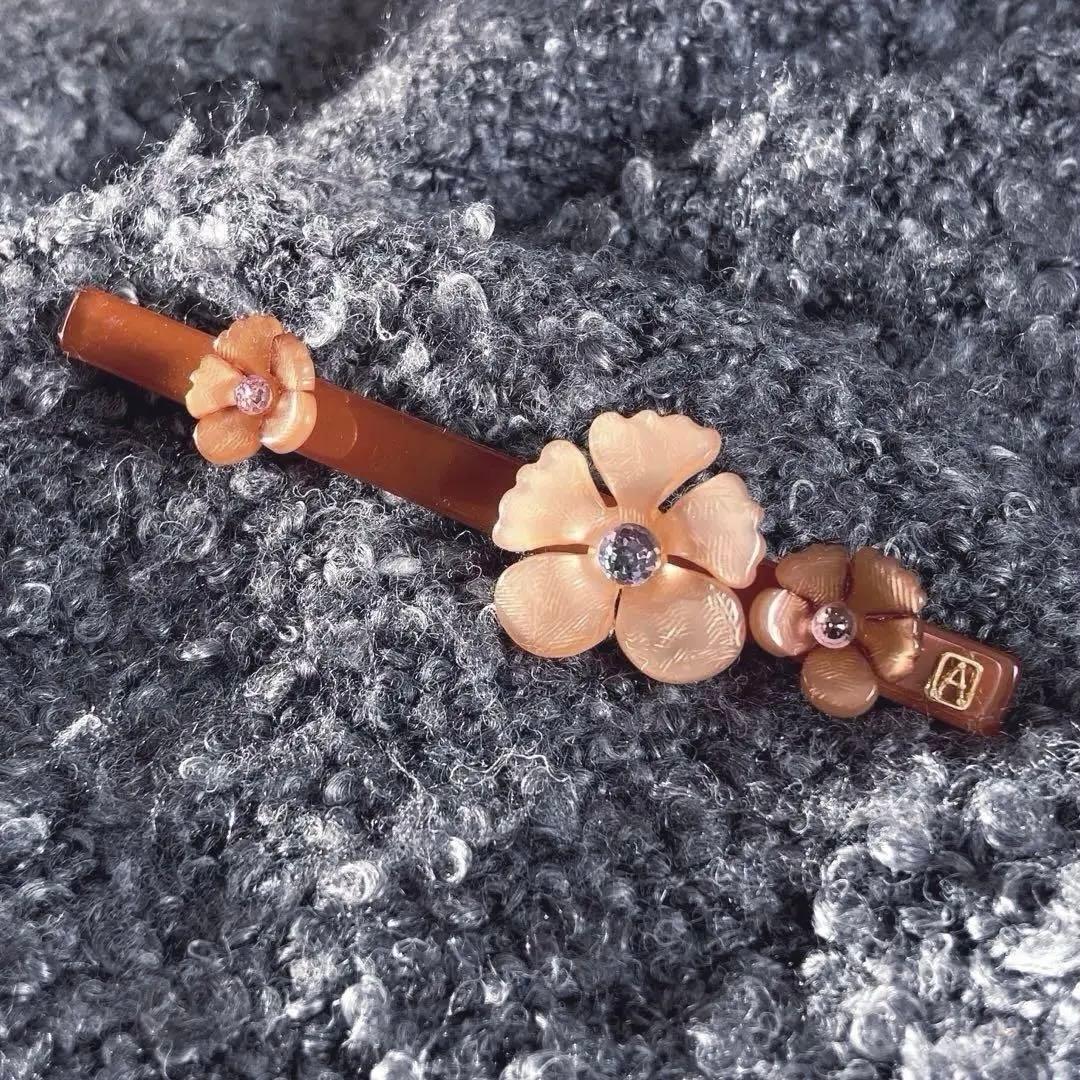 アレクサンドルドゥパリ フラワー バレッタ スワロフスキー オレンジ