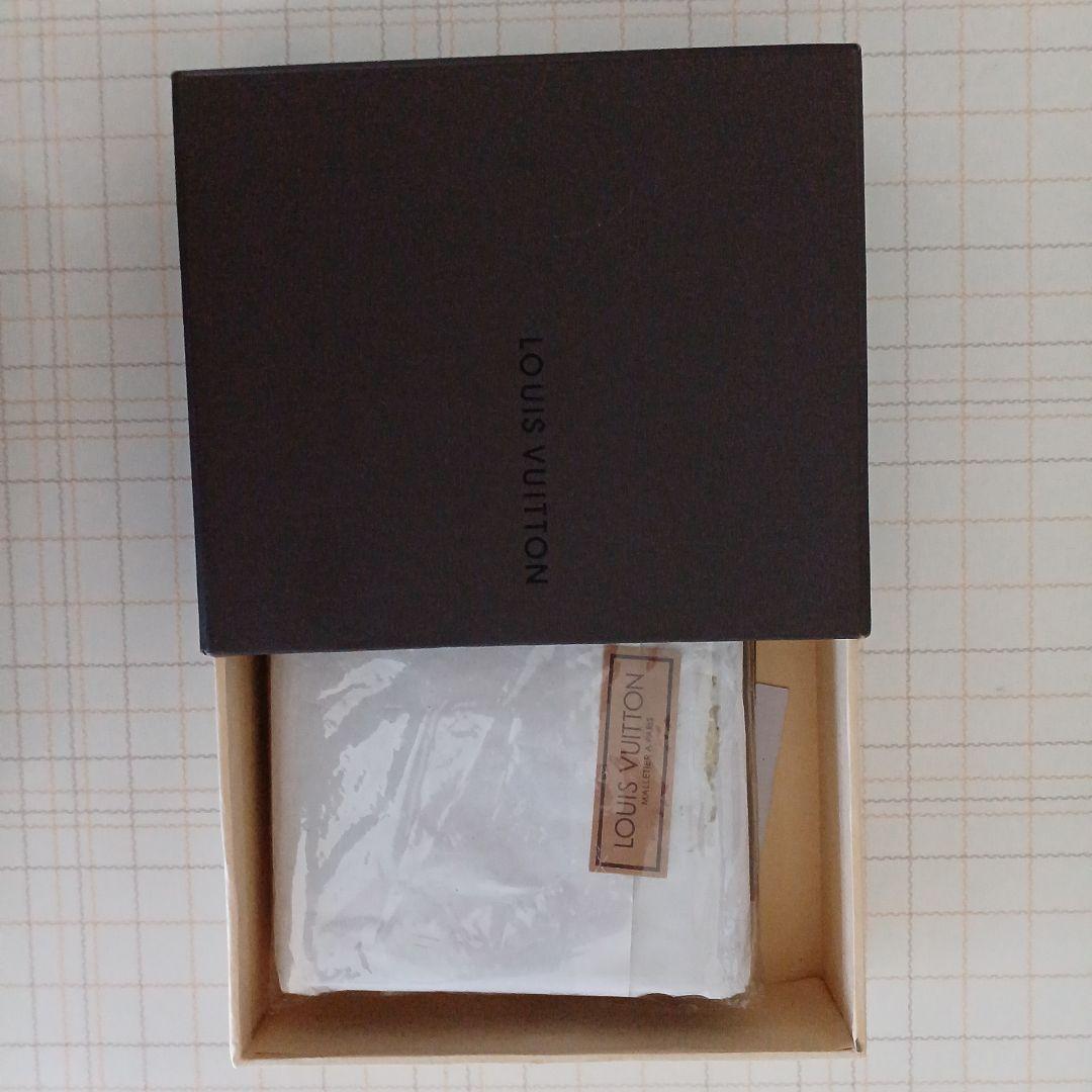 LOUIS VUITTON 二つ折り財布 M61665　メリカリAI判定価格