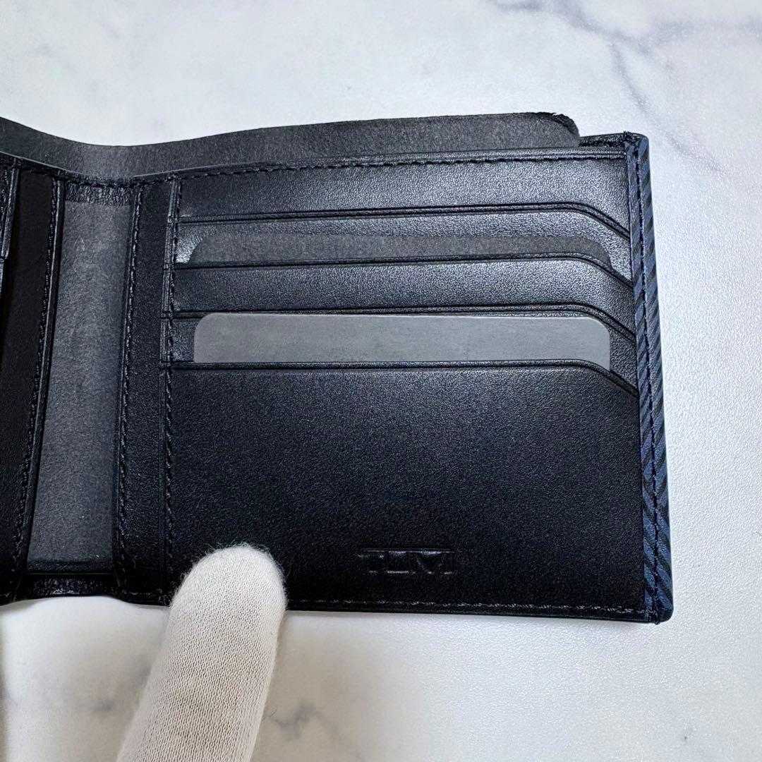 新品未使用 TUMI トゥミ 二つ折り財布 レザー ヘリンボーン 紺 札入