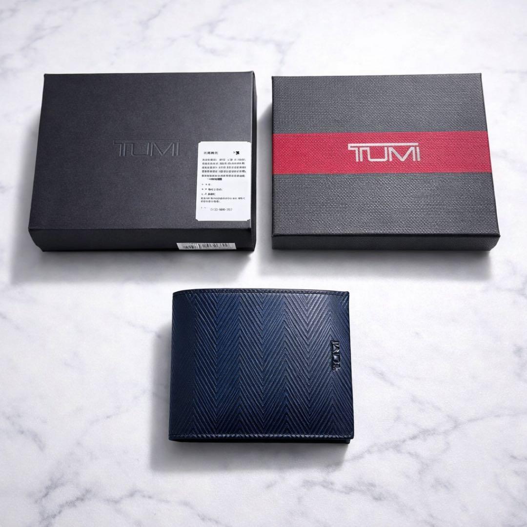 新品未使用 TUMI トゥミ 二つ折り財布 レザー ヘリンボーン 紺 札入