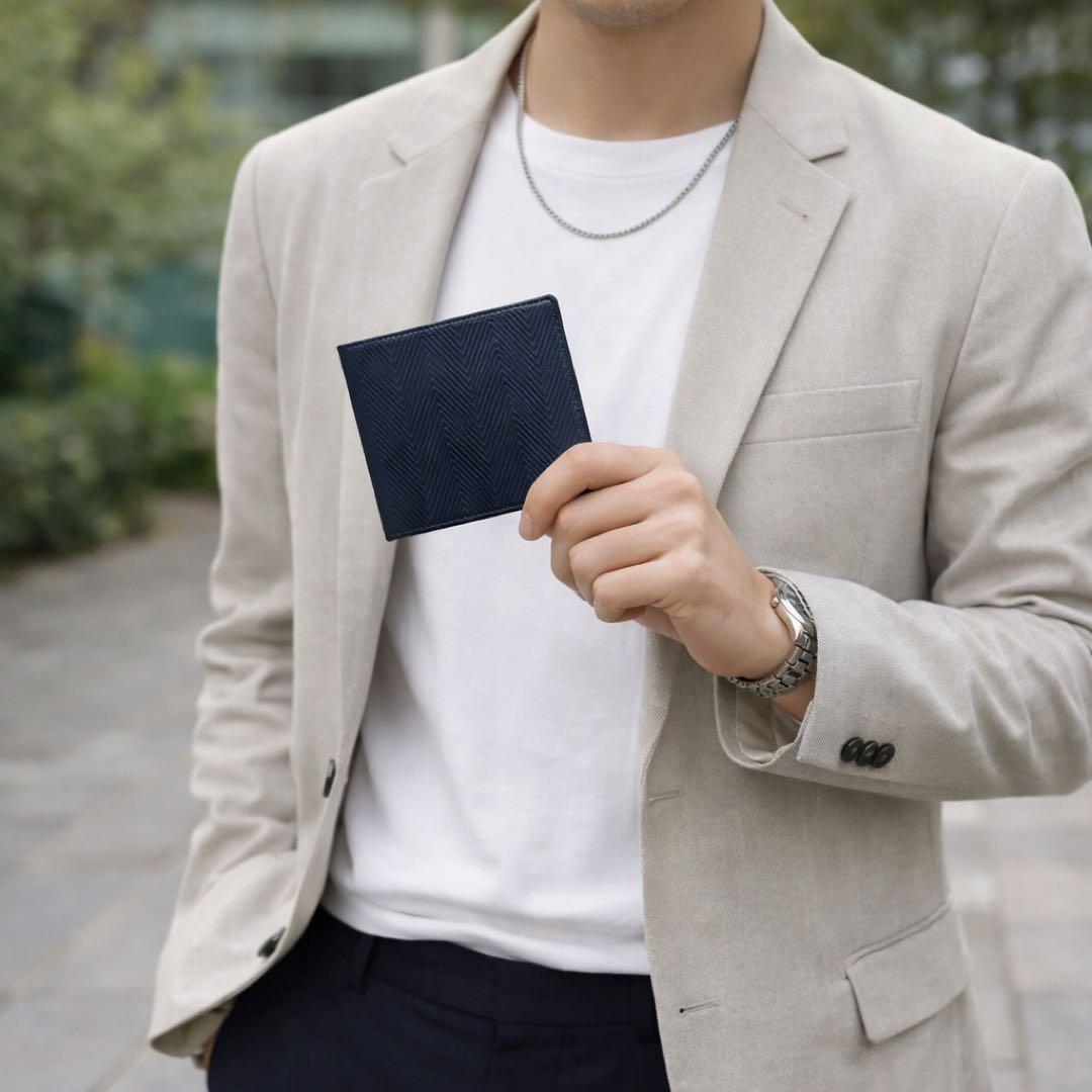 新品未使用 TUMI トゥミ 二つ折り財布 レザー ヘリンボーン 紺 札入