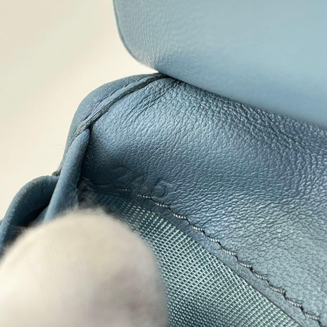 ミュウミュウ 二つ折り財布 マテラッセ クリスタル ビジュー ロゴ金具 レザー