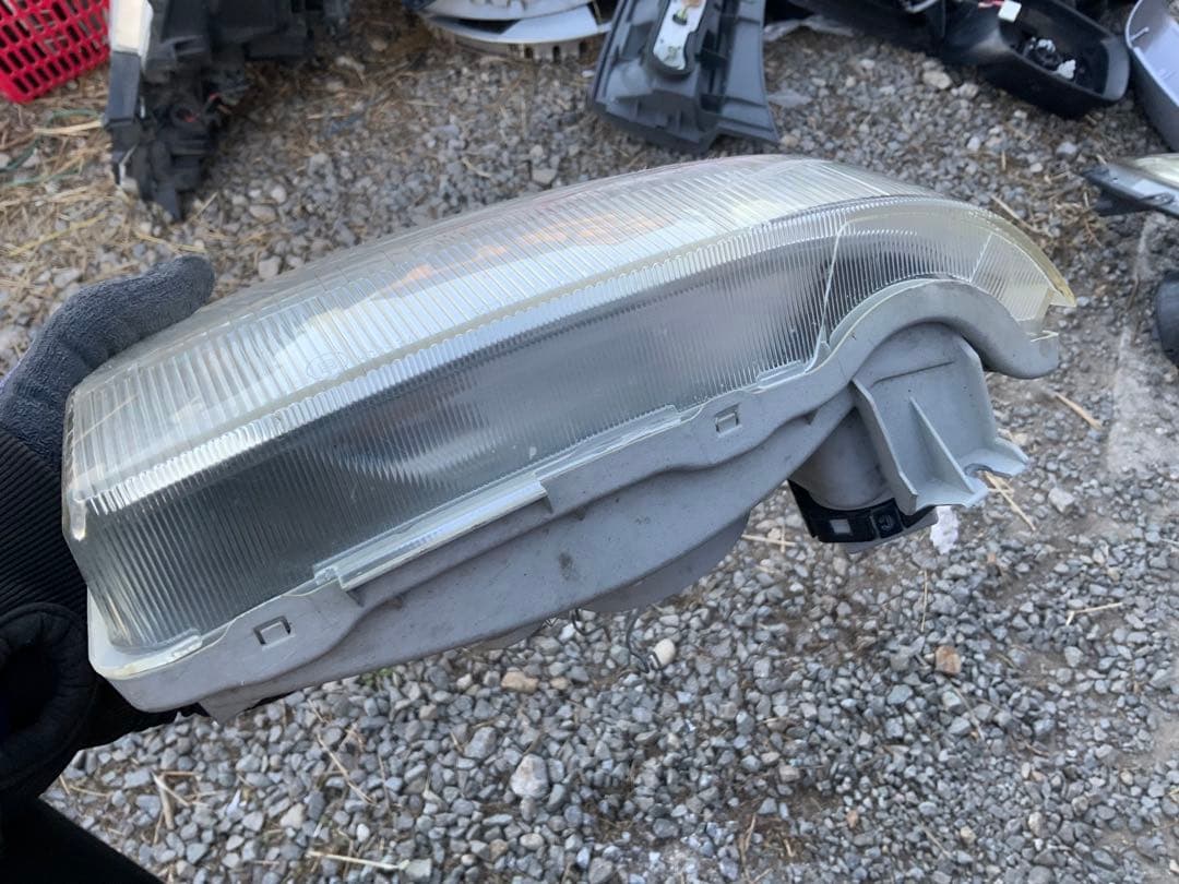 4枚目スレ傷　　キャリイ　ヘッドライト　左　レベライザー付き