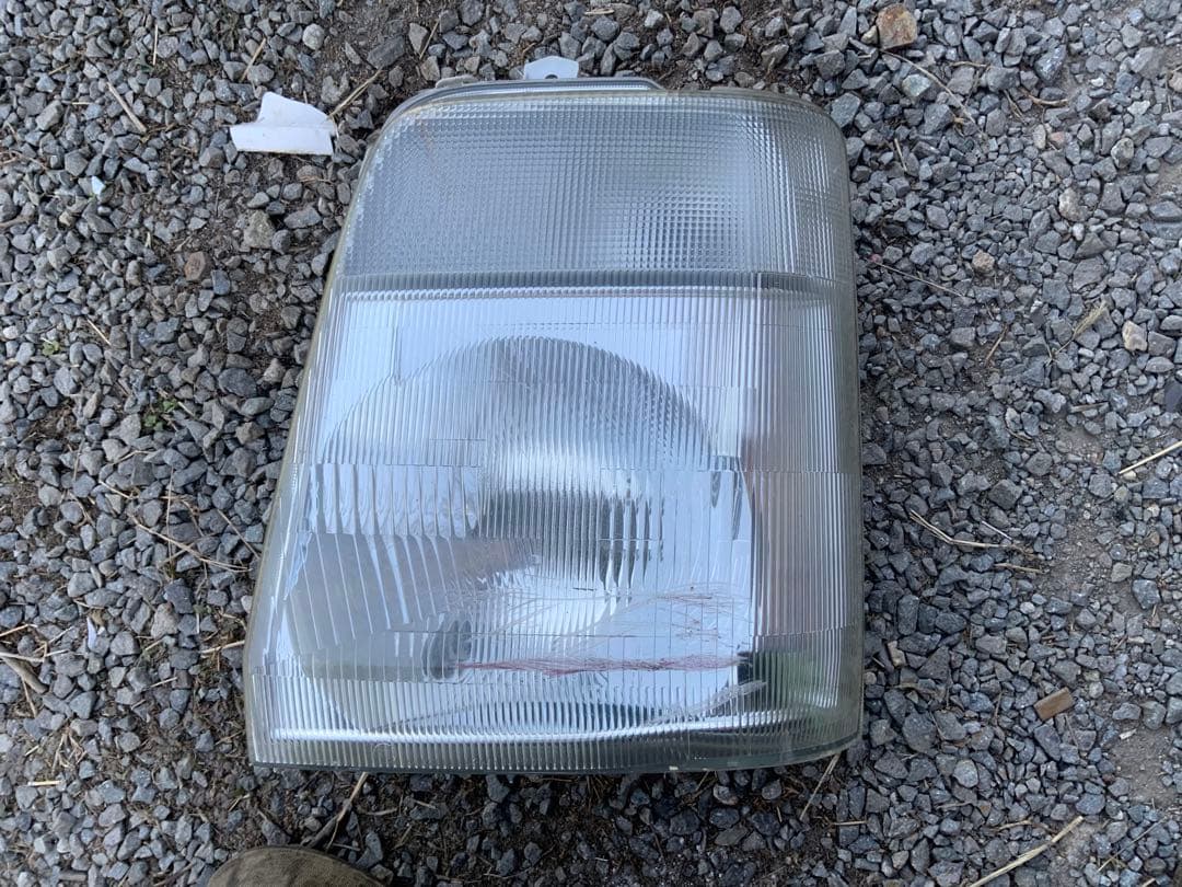 4枚目スレ傷　　キャリイ　ヘッドライト　左　レベライザー付き