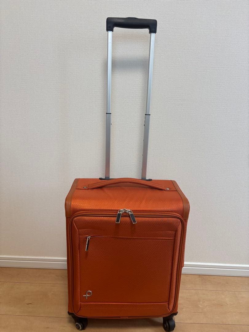 プロテカ　オレンジ キャリーケース 4輪 前面ポケット付き