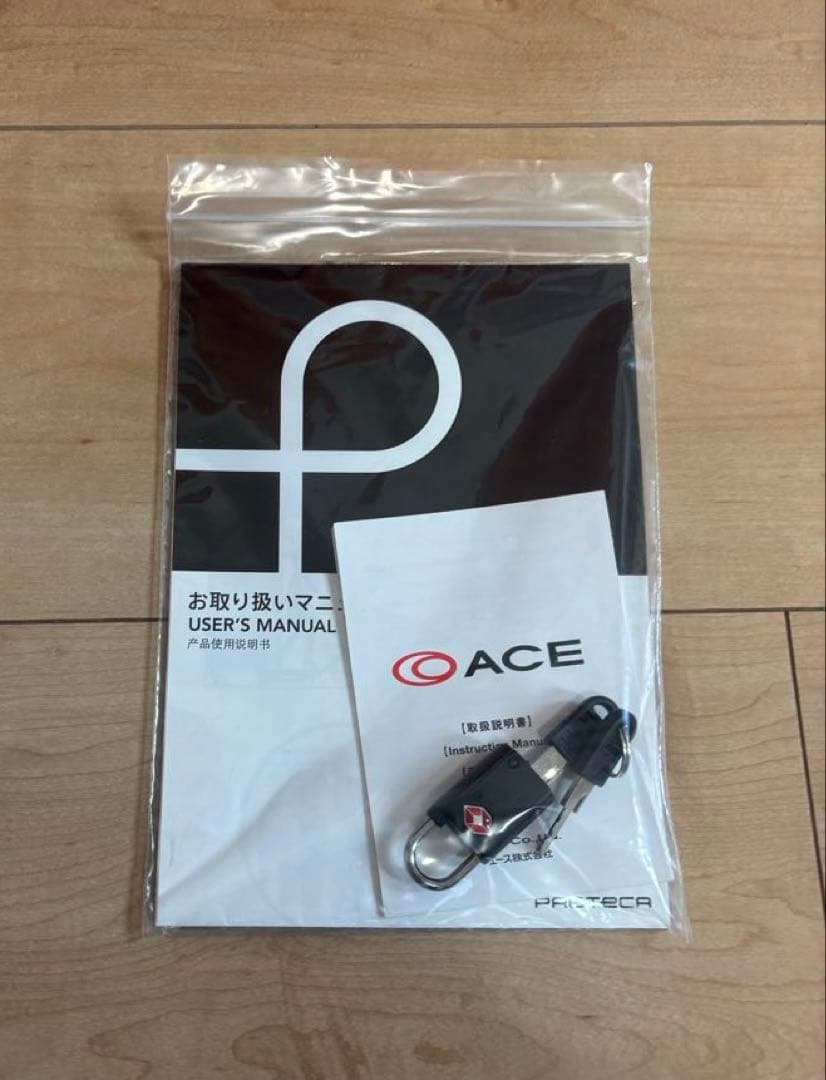 プロテカ　オレンジ キャリーケース 4輪 前面ポケット付き