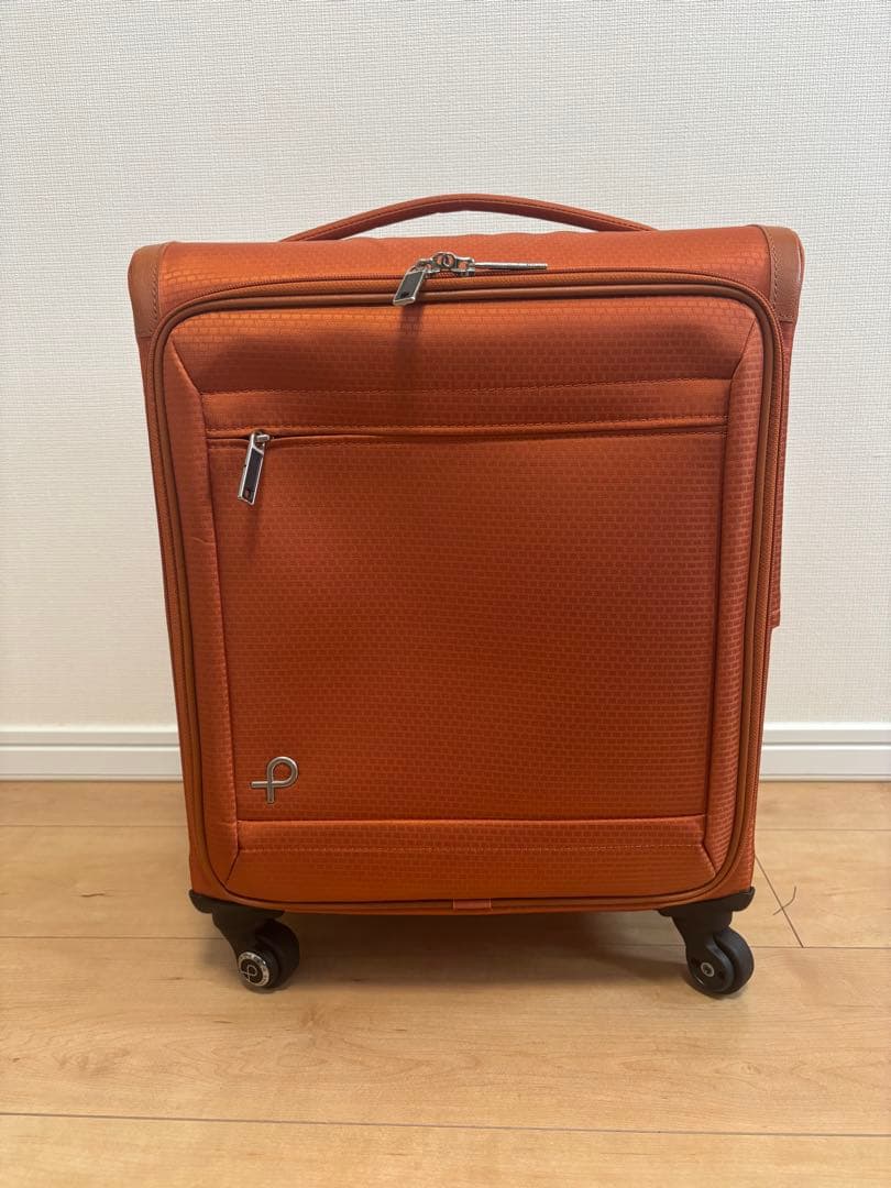 プロテカ　オレンジ キャリーケース 4輪 前面ポケット付き