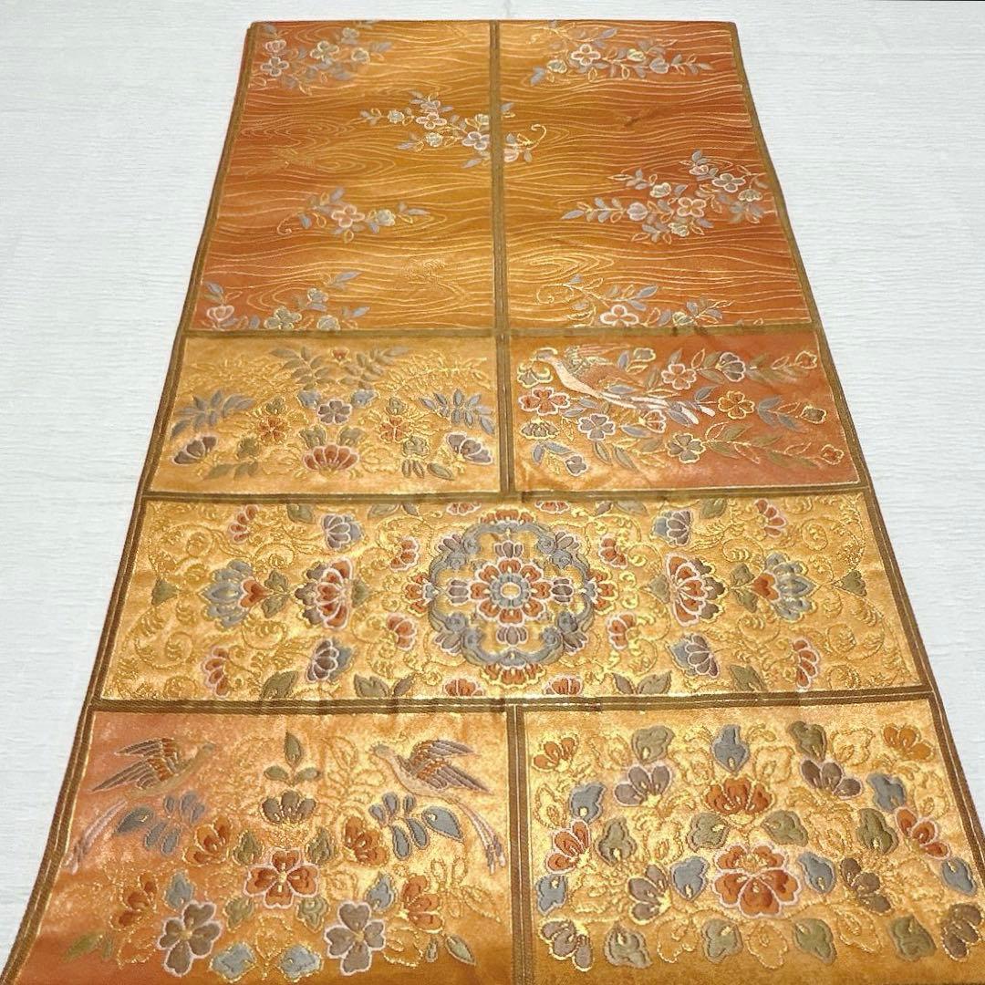 梅垣織物　袋帯　格子華文　西陣織　引箔　正絹　金糸　オレンジゴールド系　逸品